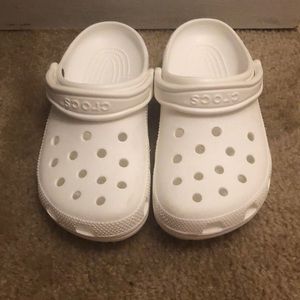 White crocs. Only worn once. Good condition